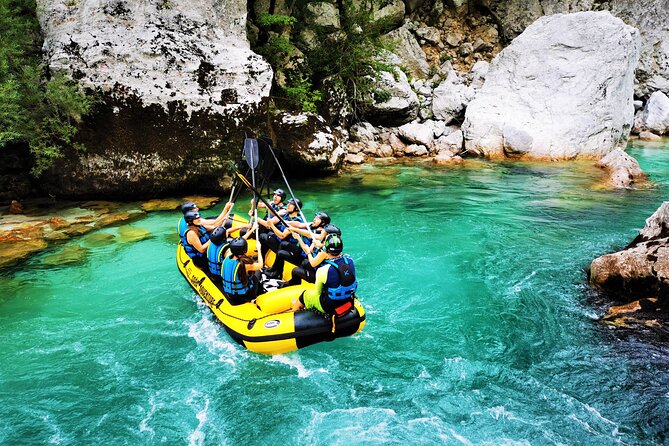 Adventure Rafting on Emerald River with Free Photos - Safety, river conditions, and group size