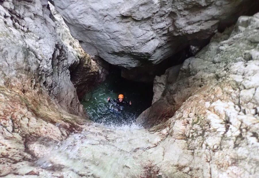 Bovec: Sušec Canyon Canyoning Experience - Entering the waterfalls of Sušec Canyon