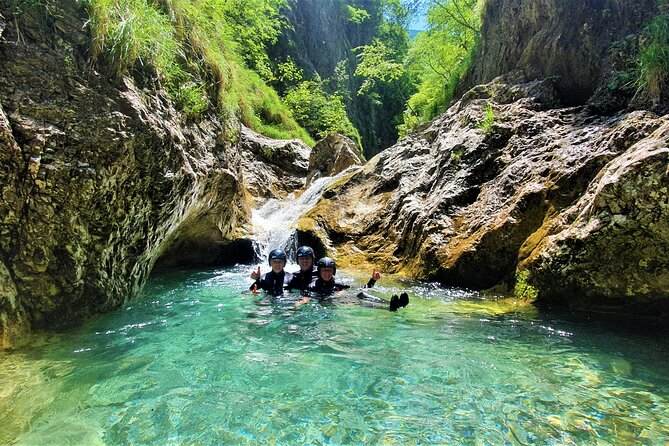 Dynamic Adventure Canyoning in Bovec with Free Photos and Videos - The 12-Meter Waterfall Finish