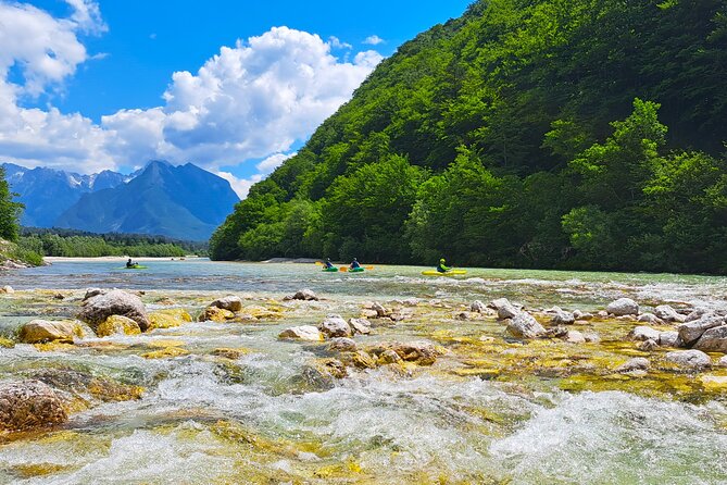 Explore Soča River on Sit on top Kayak with Free Photos - The 1.5-hour paddle through mountain scenery