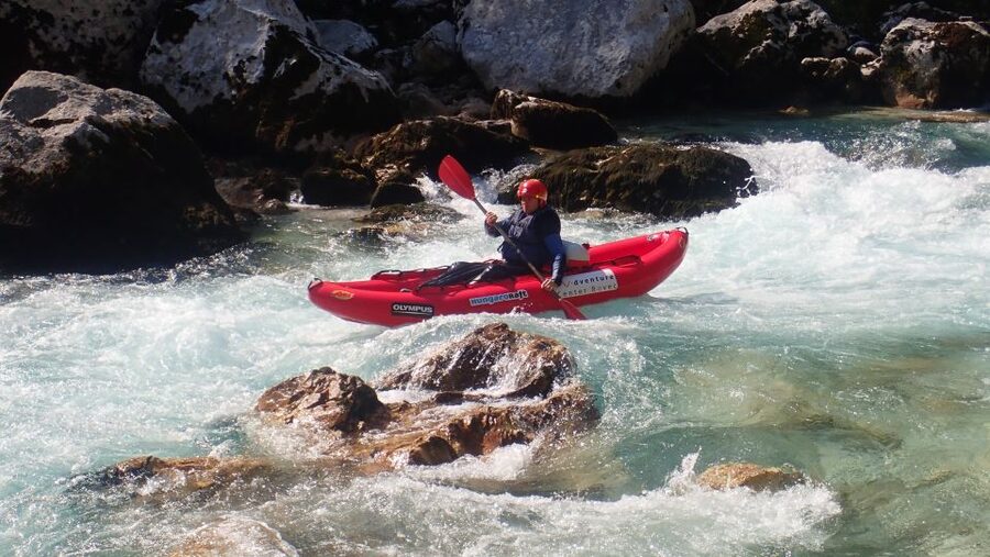 From Bovec: Whitewater kayaking on the Soča River - Running waves and class III rapids