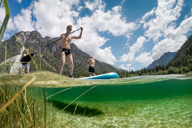 Half Day Stand-up Paddle Boarding (SUP) trip on Lake Predil - Paddling the beaches and freshwater springs