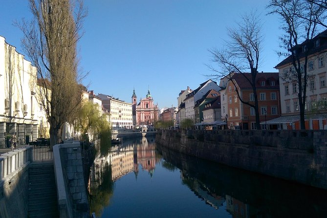 Ljubljana City Tour Including Ljubljana Castle - Dragon Bridge, local legend, and the main market