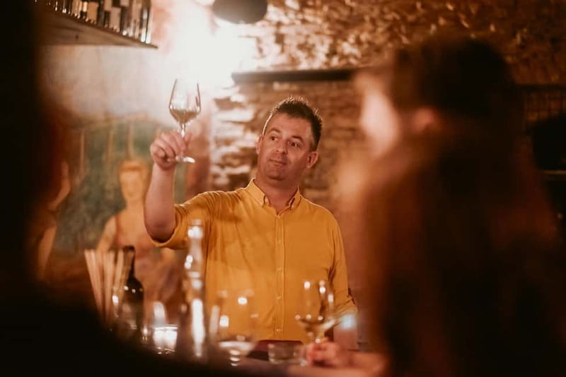 Ljubljana: Wine Tasting Experience with Appetizers - Entering Ljubljana Castle’s old wine cellar