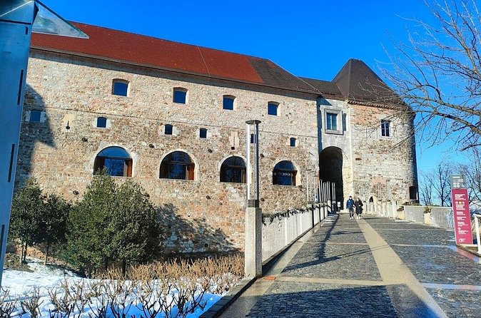 Old Town and Castle Group Tour in Ljubljana - St. Florian’s Church and Ljubljana’s fire stories