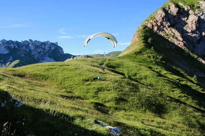 Private Paragliding Flight Experience over the Julian Alps - The Mangart road is part of the adventure